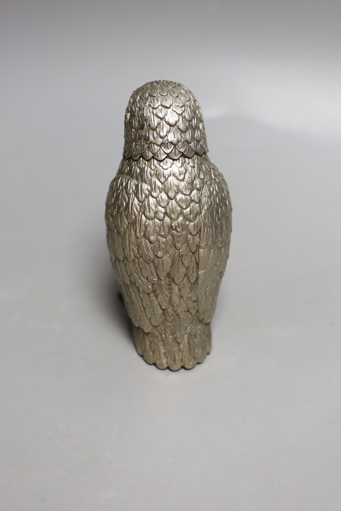 A silvered metal ‘owl’ sugar caster, 13cm